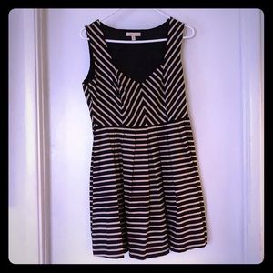 Navy and cream striped mid sleeveless dress.